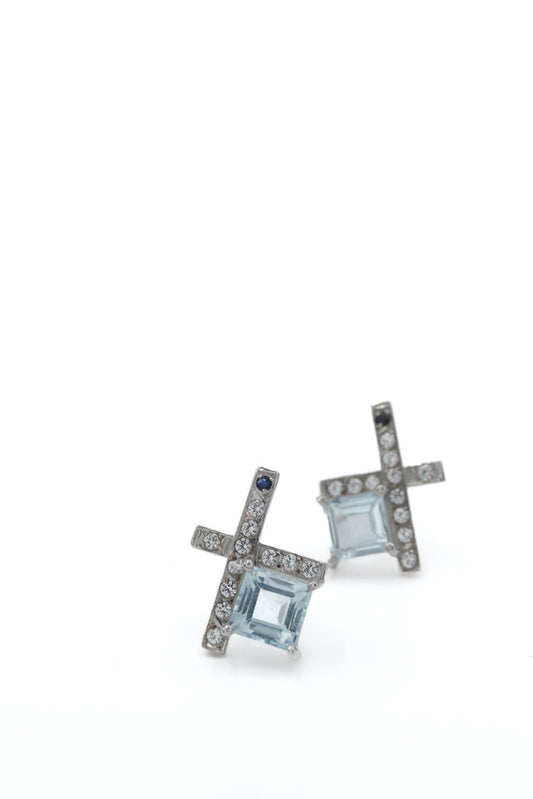 Perpetual Button Earrings With Blue Topaz